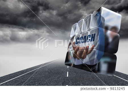 Composite image of businessman holding coach text on abstract sc Composite image of businessman holding coach text on abstract sc 9813245