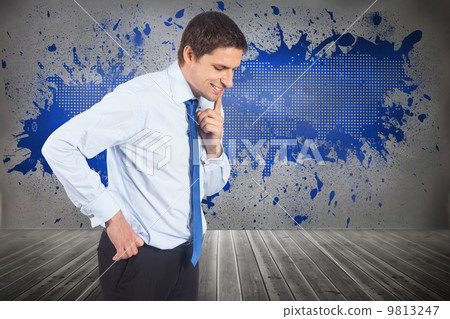 Composite image of thinking businessman touching his chin 9813247