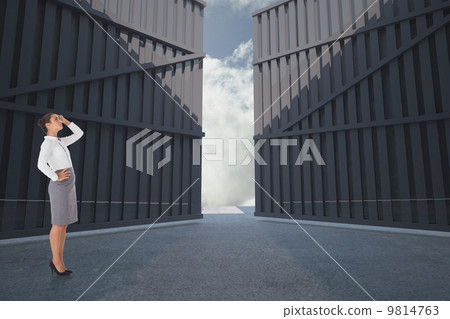 Composite image of focused businesswoman 9814763