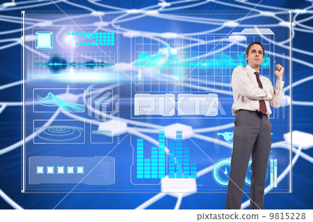Composite image of thinking businessman holding pen 9815228