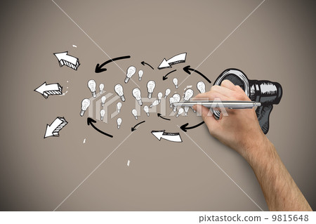 Composite image of hand holding a silver pen 9815648