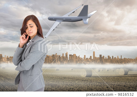 Composite image of worried businesswoman Composite image of worried businesswoman 9816532