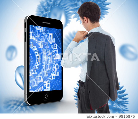 Composite image of businessman holding his jacket 9816876