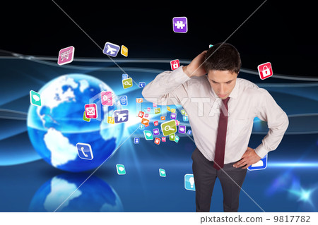 Composite image of thinking businessman scratching head 9817782