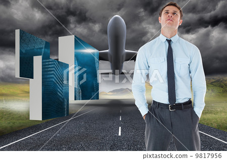 Composite image of serious businessman standing with hands in po Composite image of serious businessman standing with hands in po 9817956