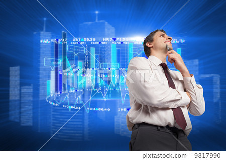 Composite image of thoughtful businessman holding pen to chin Composite image of thoughtful businessman holding pen to chin 9817990
