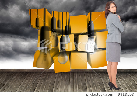 Composite image of focused businesswoman Composite image of focused businesswoman 9818198