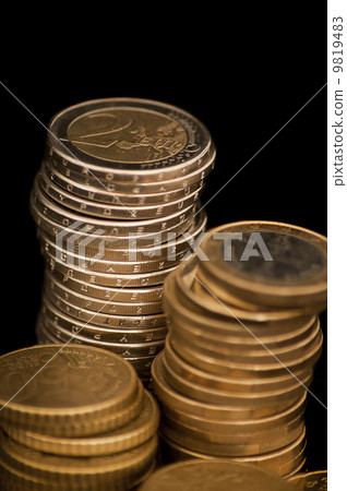 Euro coins isolated on black background Euro coins isolated on black background 9819483
