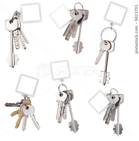set of bunch of home keys with blank keychain 9823701