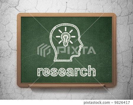 Marketing concept: Head With Lightbulb and Research on chalkboard background 9826417