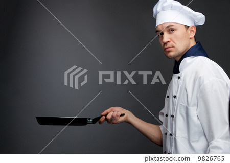 chef holding pan chef holding pan 9826765