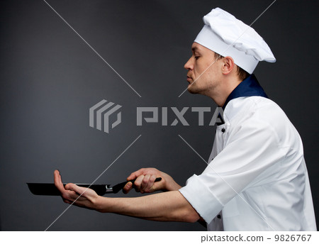 chef holding pan chef holding pan 9826767