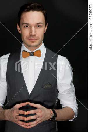 man in suit with bow-tie man in suit with bow-tie 9826973