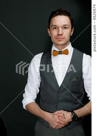 man in suit with bow-tie man in suit with bow-tie 9826974
