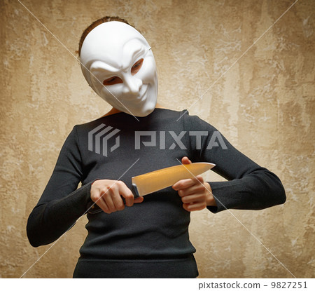 Woman in white mask holding the knife Woman in white mask holding the knife 9827251