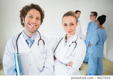 Portrait of smiling doctors 9827850