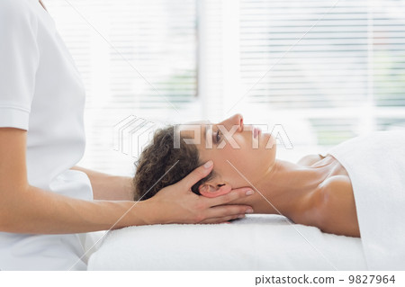 Woman receiving body massage in health spa Woman receiving body massage in health spa 9827964