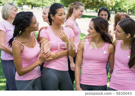 Volunteers discussing during breast cancer awareness Volunteers discussing during breast cancer awareness 9830043