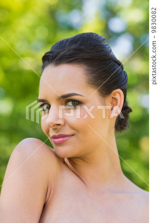 Close-up portrait of beautiful woman in park Close-up portrait of beautiful woman in park 9830082