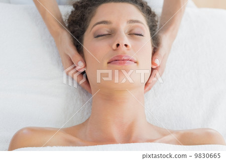Woman receiving massage in health spa Woman receiving massage in health spa 9830665