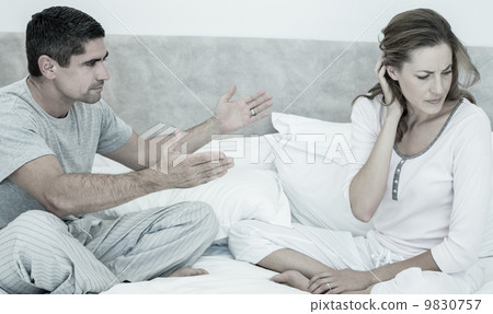 Conflicting couple in bed Conflicting couple in bed 9830757