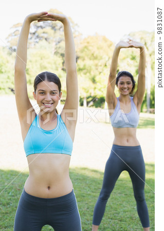 Portrait of sporty women exercising 9831087