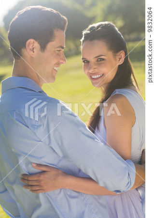 Portrait of a loving and happy couple at park 9832064