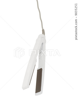 electric iron for hair isolated on white electric iron for hair isolated on white 9835251