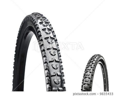 two bicycle wheels closeup 9835433