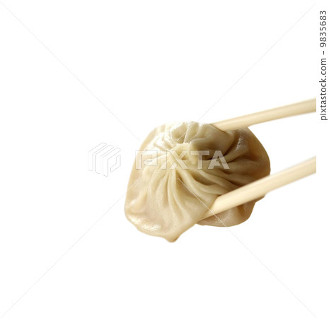 Ravioli with chopsticks isolated 9835683