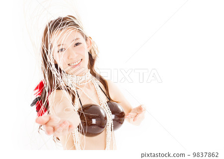 A beautiful woman who dances happily in Tahitian dance with plenty of tropical atmosphere A beautiful woman who dances happily in Tahitian dance with plenty of tropical atmosphere 9837862