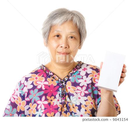 Asian old woman holding blank box 9843154