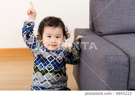 Asian baby finger pointing up Asian baby finger pointing up 9843222
