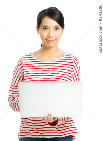 young woman with laptop isolated on white young woman with laptop isolated on white 9843286