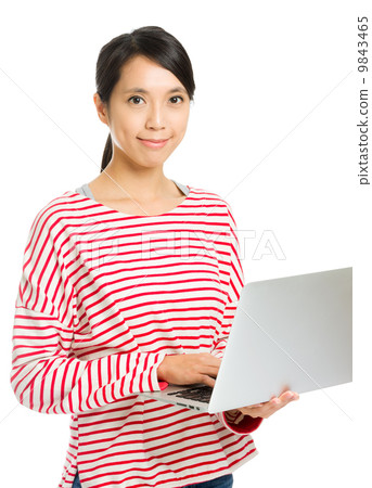 Asian woman using laptop Asian woman using laptop 9843465