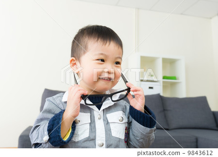Asian little boy wear glasses 9843612