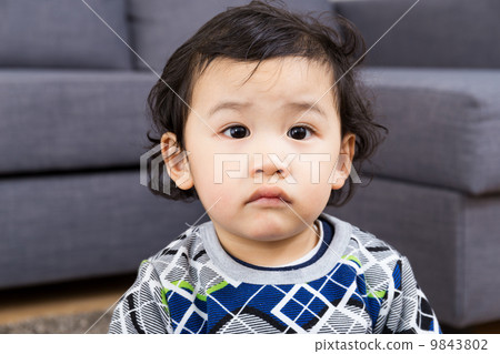 Asian baby feel upset 9843802