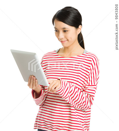 Asian woman using tablet 9843808