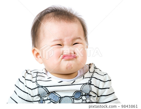 Asian baby girl make upset face Asian baby girl make upset face 9843861