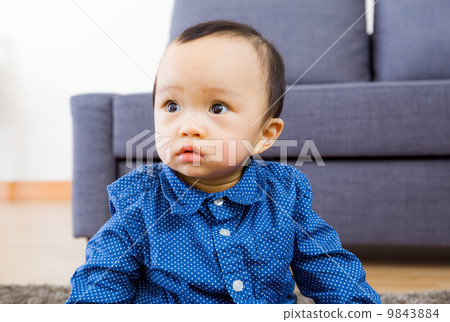 Asian baby boy feel curiosity 9843884