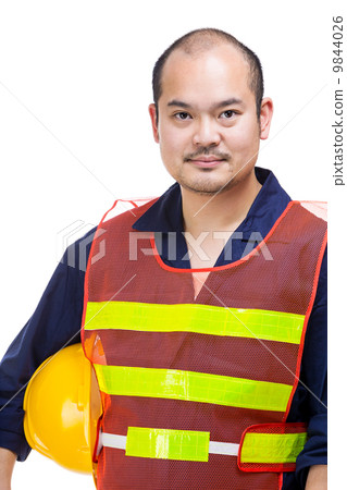 Construction worker holding safety helmet 9844026