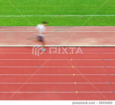 Man running on track Man running on track 9844060