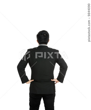 Back view with businessman hand on hip 9844090