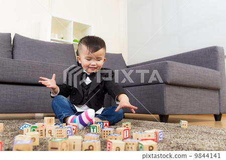 Little boy play toy block Little boy play toy block 9844141