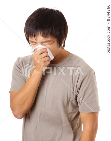 Sneezing asian man 9844266
