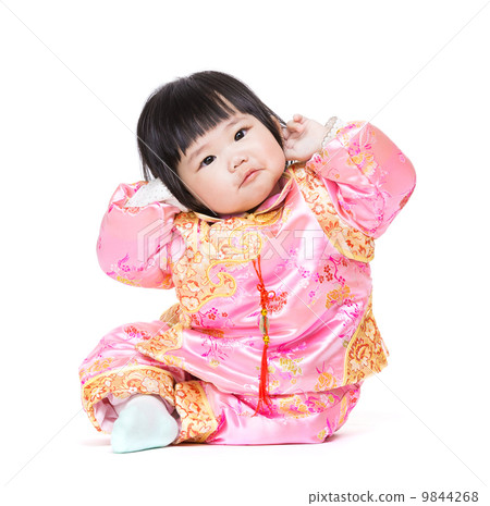 Baby have funny posture with traditional china costume Baby have funny posture with traditional china costume 9844268