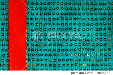 Green sequine background texture abstract cloth textile and red ribbon 9846158