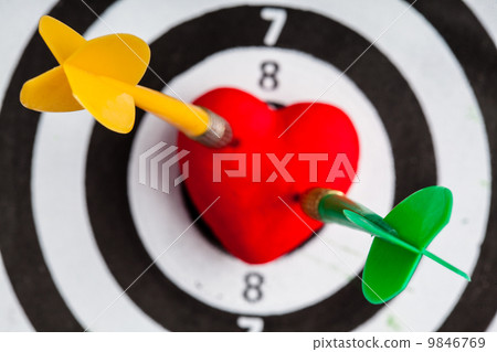 Black white target with two darts in heart love symbol as bullseye Black white target with two darts in heart love symbol as bullseye 9846769