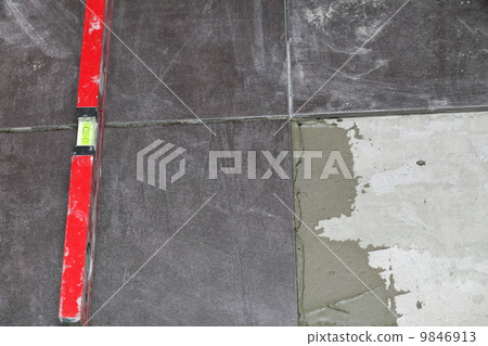 Construction level tiling at home tile floor adhesive Construction level tiling at home tile floor adhesive 9846913