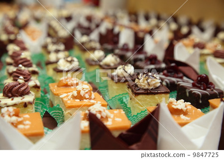 Varieties of cakes desserts catering sweets 9847725